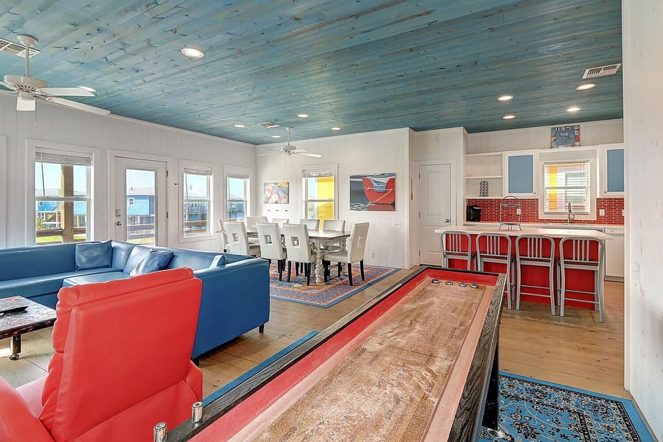 Living Area - The kitchen, dining, and living areas blend seamlessly for a bright and airy feel