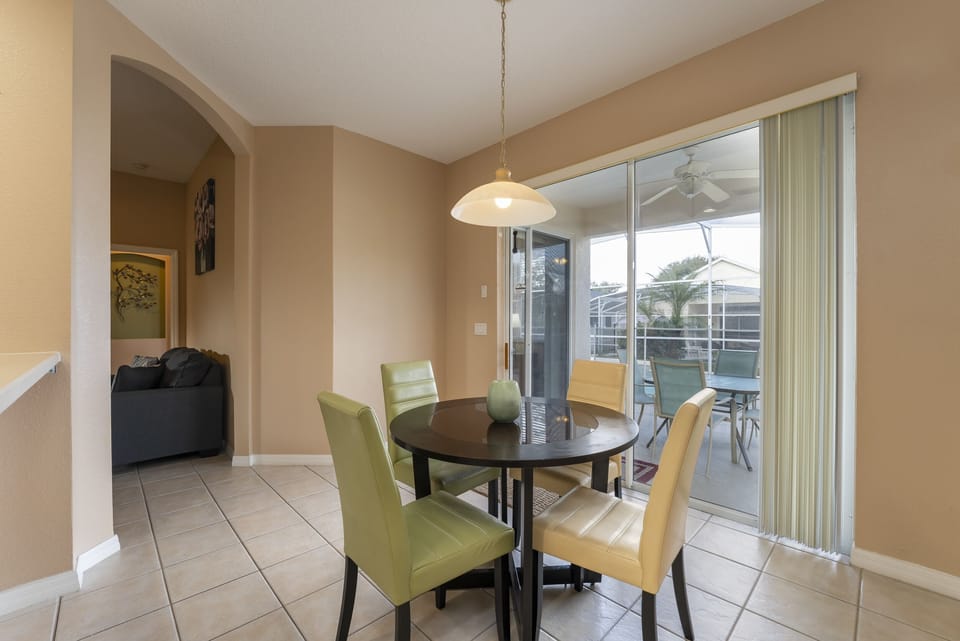 Dining area with patio access.
