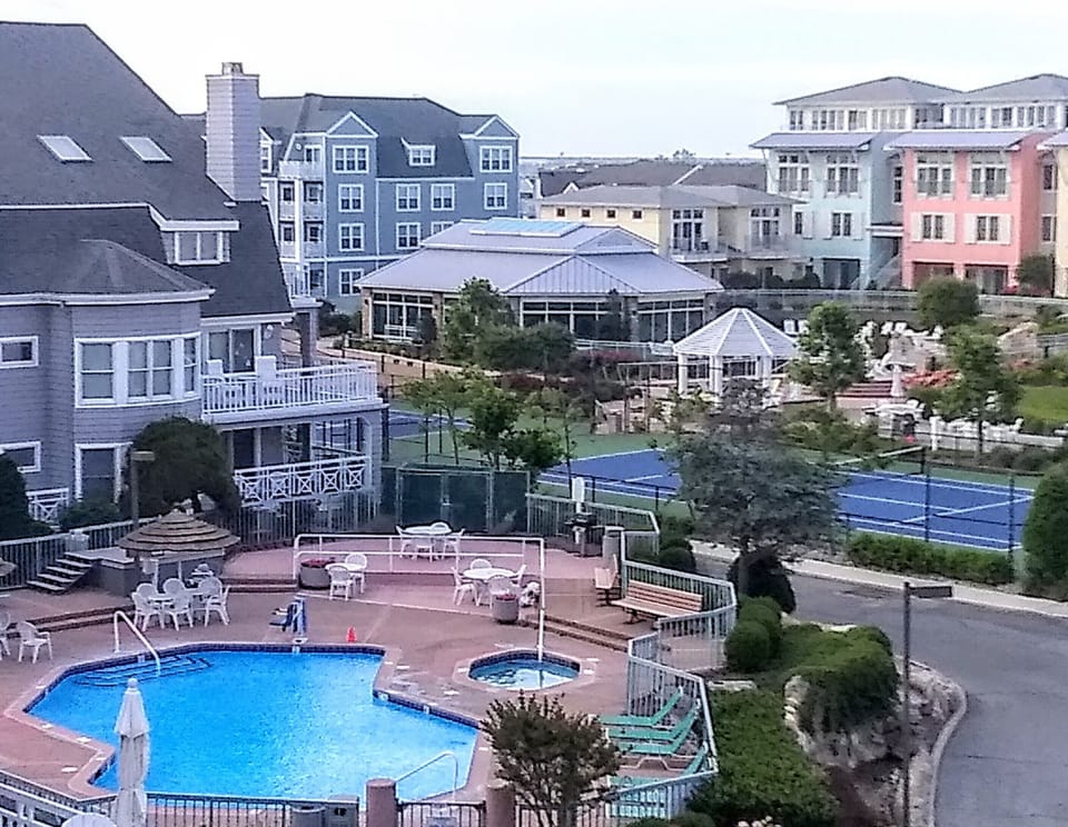 VIEW ONE OF THE  4 POOLS FROM YOUR PRIVATE BALCONY