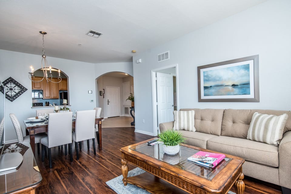 The integrated living and dining room – where every corner whispers comfort and sophistication, inviting you to gather, dine, and savor the moments in a space that feels like home. Embrace the beauty of shared experiences.