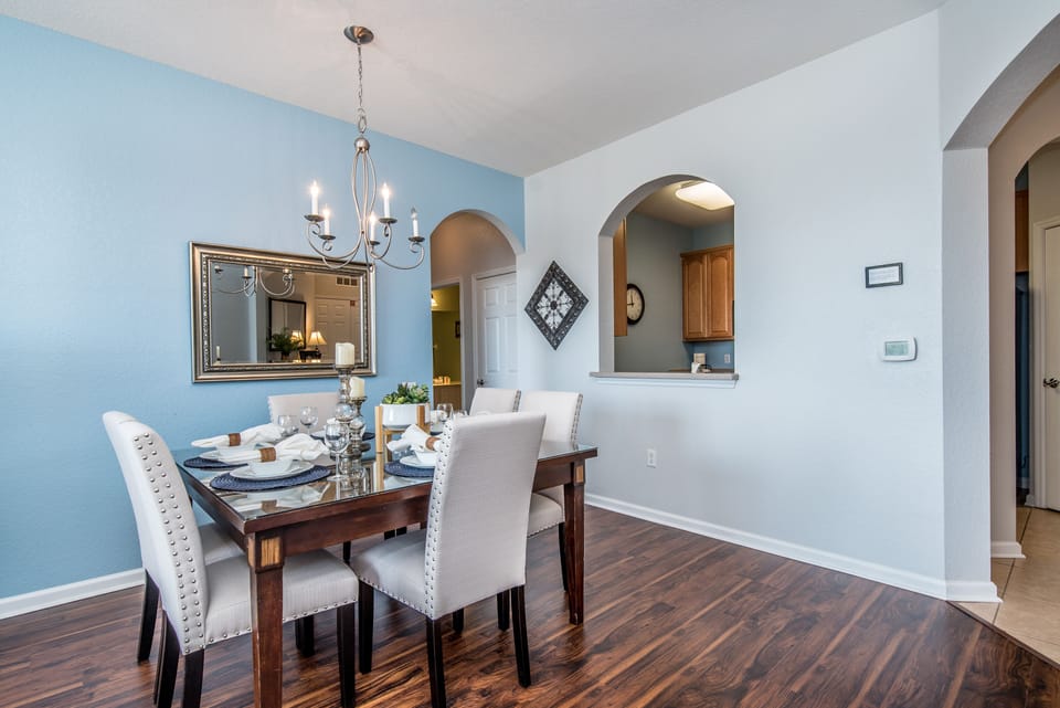 Where culinary artistry meets contemporary comfort – the modern kitchen and dining area beckon with inviting seating and stylish design. Gather, dine, and savor the moments in this perfect fusion of style and function.