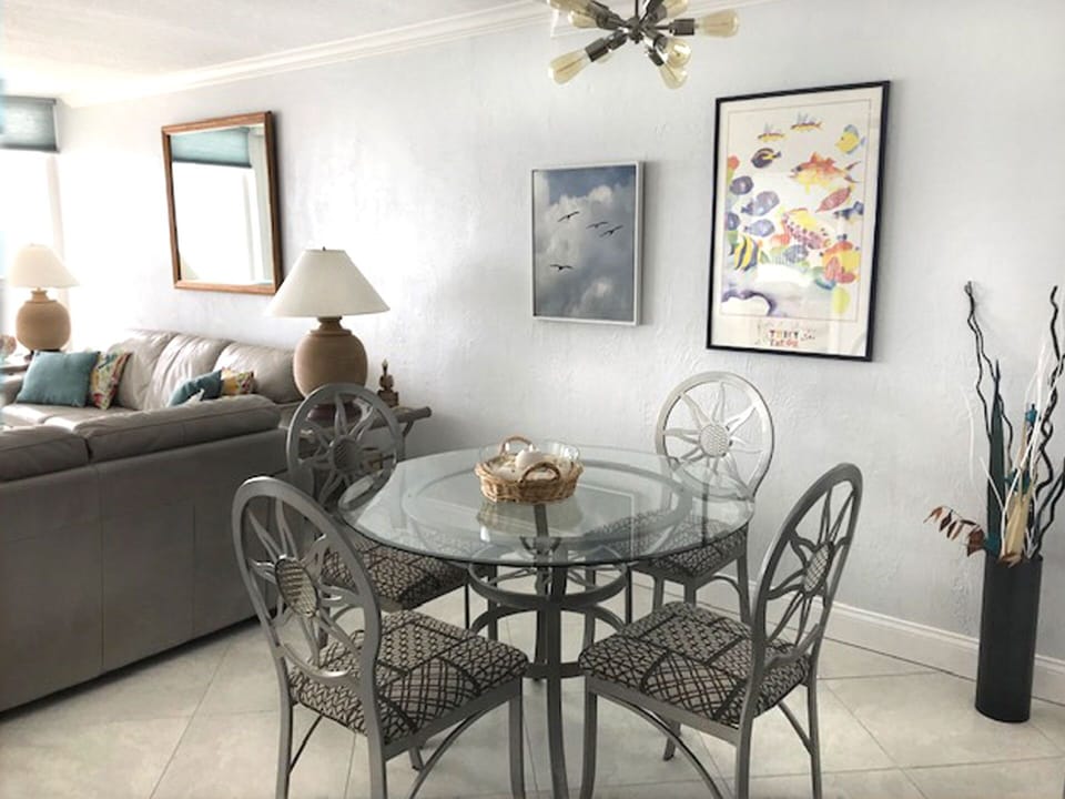 Round dining table seats six.