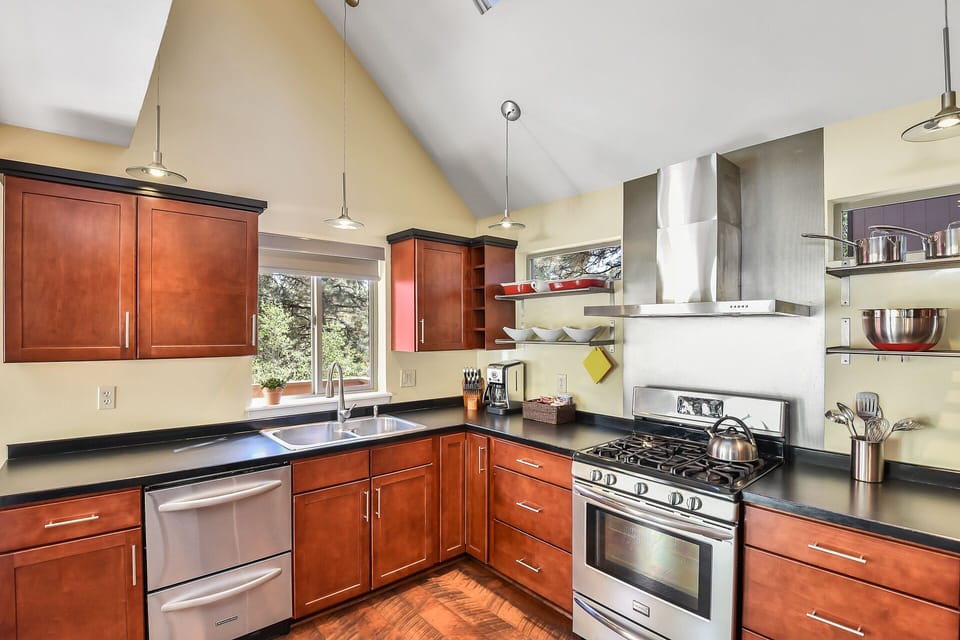 Kitchen with a view, gas range with convection oven.