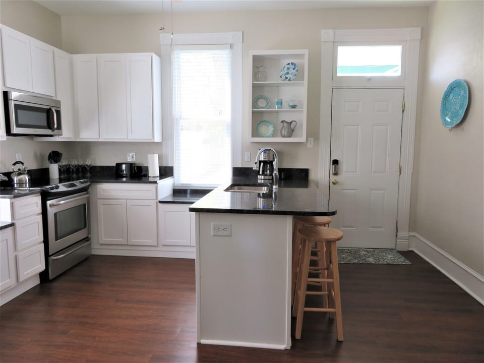 Plenty of space in this kitchen to spread out and cook for your group.