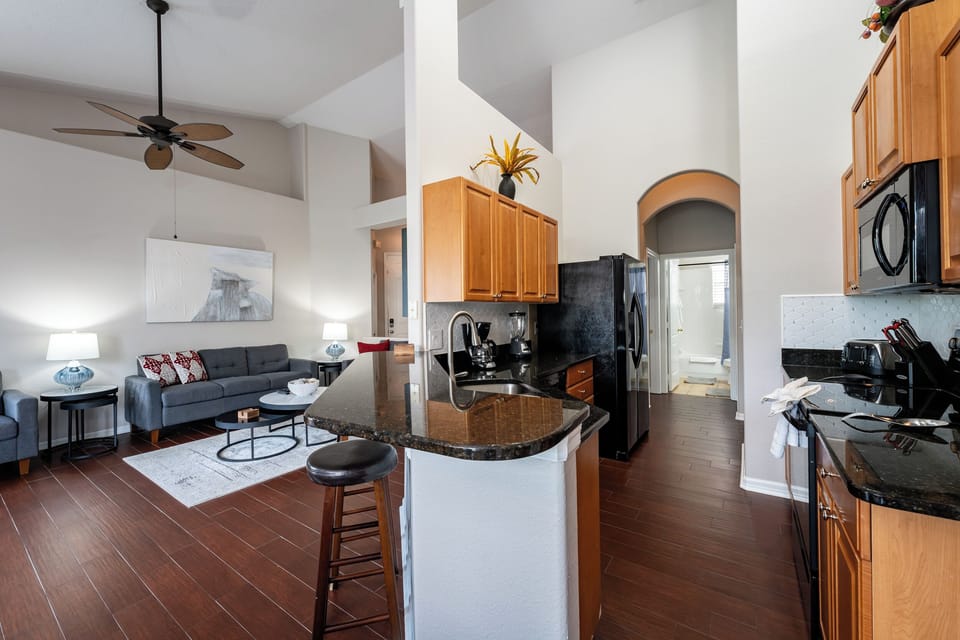 View of kitchen showing breakfast bar.