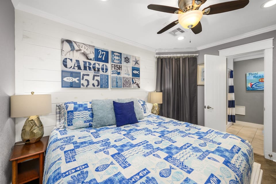 3rd bedroom with king bed and attached full bath.