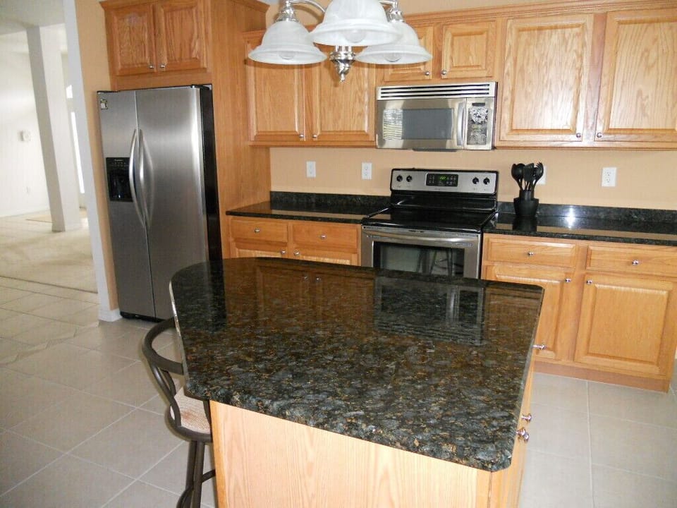 Cook in the spacious kitchen or chat with friends at the breakfast bar