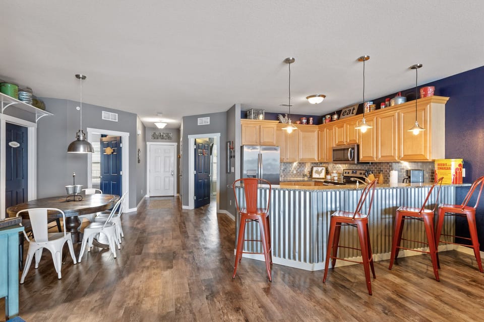 Seating for everyone in the open kitchen / dining space & bar.