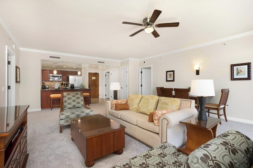 Bright island suite with spacious seating, full kitchen, and dining area.