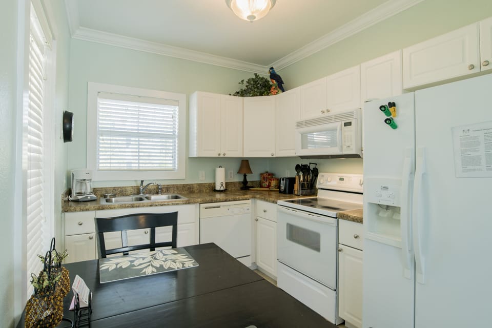 11 Purple Parrot Resort One Bedroom Condo 18cd by Perdido Key Resort Management Kitchen