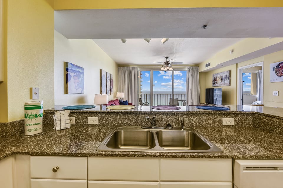 Fully Stocked Kitchen overlooking Living Room