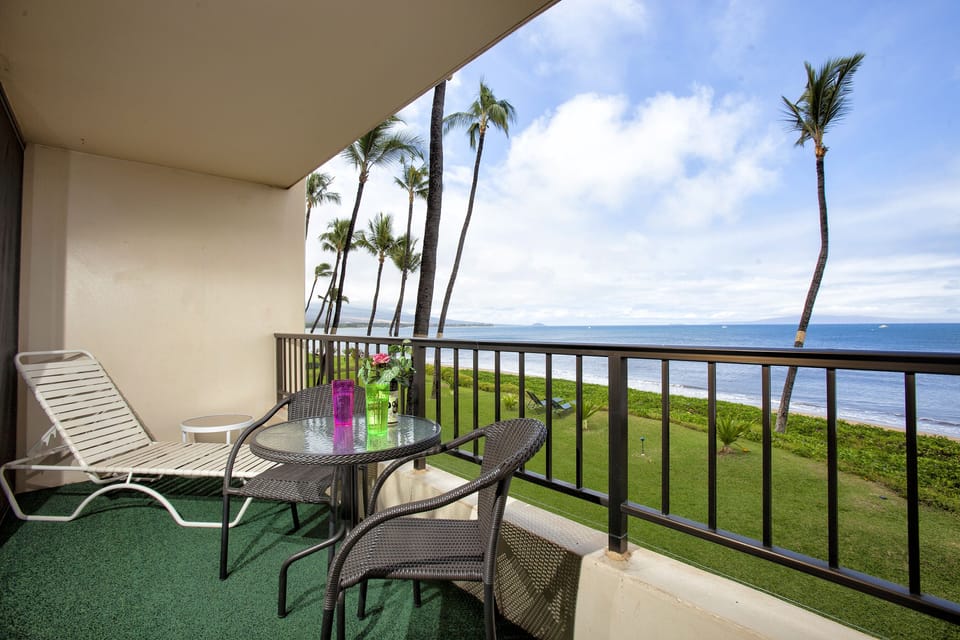 Your private oceanfront balcony frames swaying palms and endless blue horizons. Sip morning coffee at your table, lounge in the sun, and let tropical breezes refresh you.