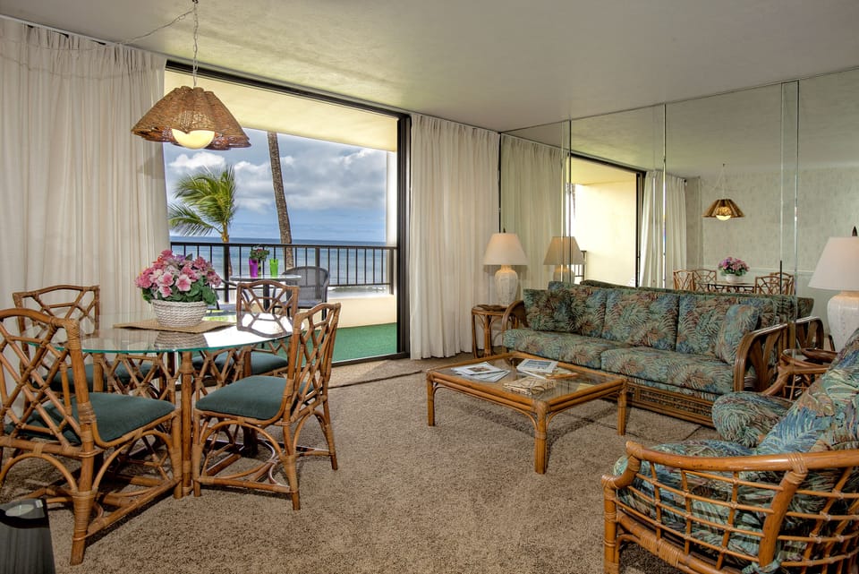 Relax in your bright, tropical-inspired living space with island-style furnishings and a private balcony overlooking the ocean—your perfect retreat after exploring.