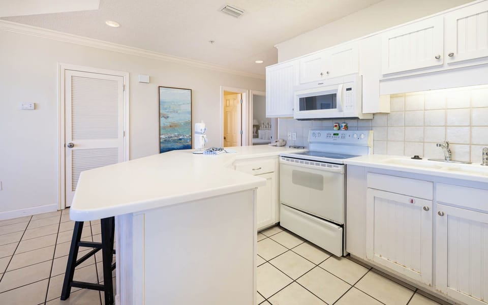 Prepare meals in this bright kitchen with ample counter space and a welcoming atmosphere for family gatherings