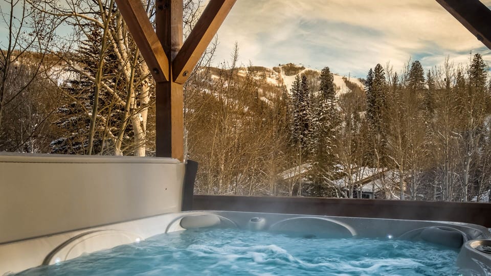 Private hot tub with snowy views