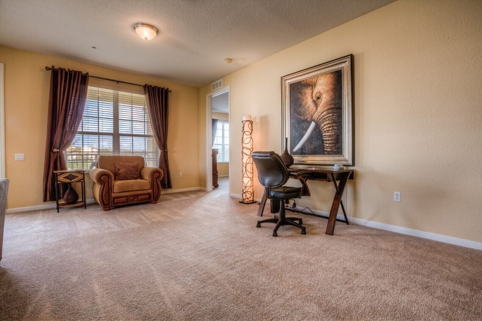 Experience the epitome of luxury, conveniently located near SeaWorld Orlando. Discover a dedicated workspace for productivity, adorned with elegant décor that complements the spacious layout.