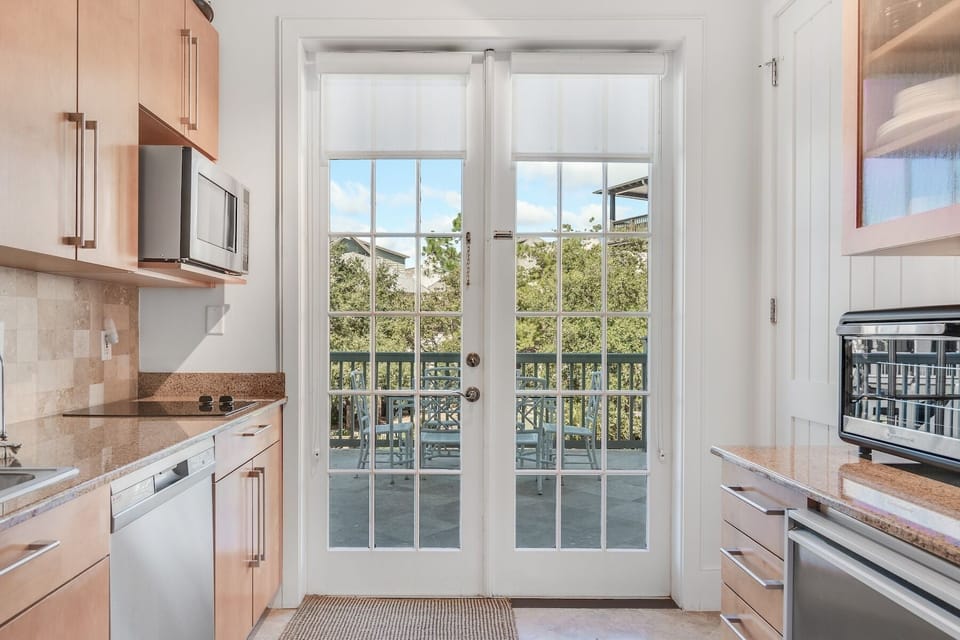 Rear dining table on common area balcony.