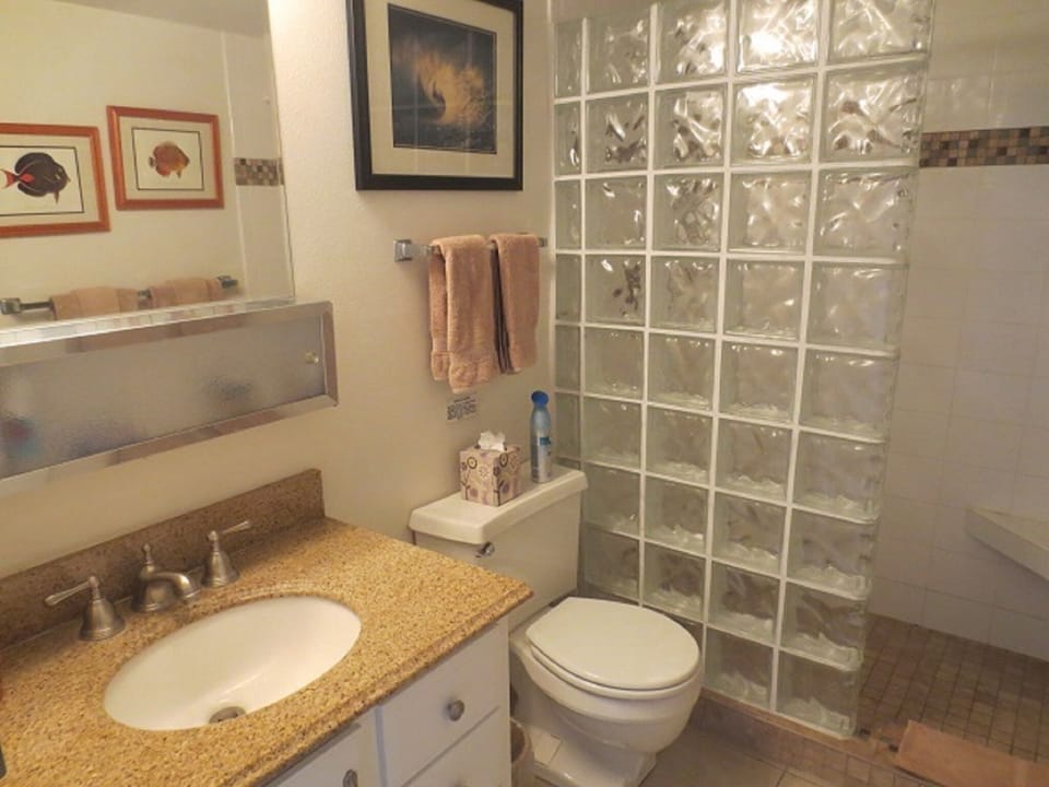 Bathroom - Bathroom with glass tile shower.
