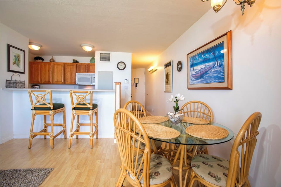 Settle in at your dining table for six or pull up a seat at the breakfast bar. The coastal-themed decor and open layout create a welcoming space for meals and memories.