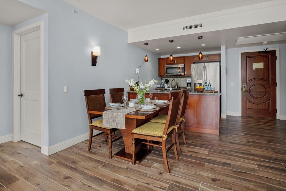 Cozy island dining with elegant decor and fully equipped kitchen.