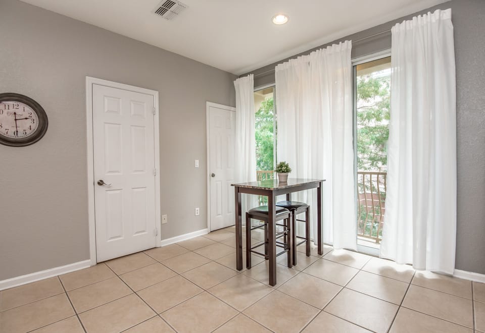 Cozy Corner: Enjoy a cup of coffee by the window, basking in natural light, with the convenient coffee table nearby.