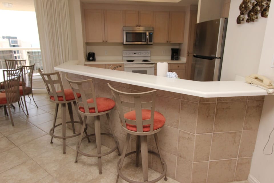 Bar area with seating for 3