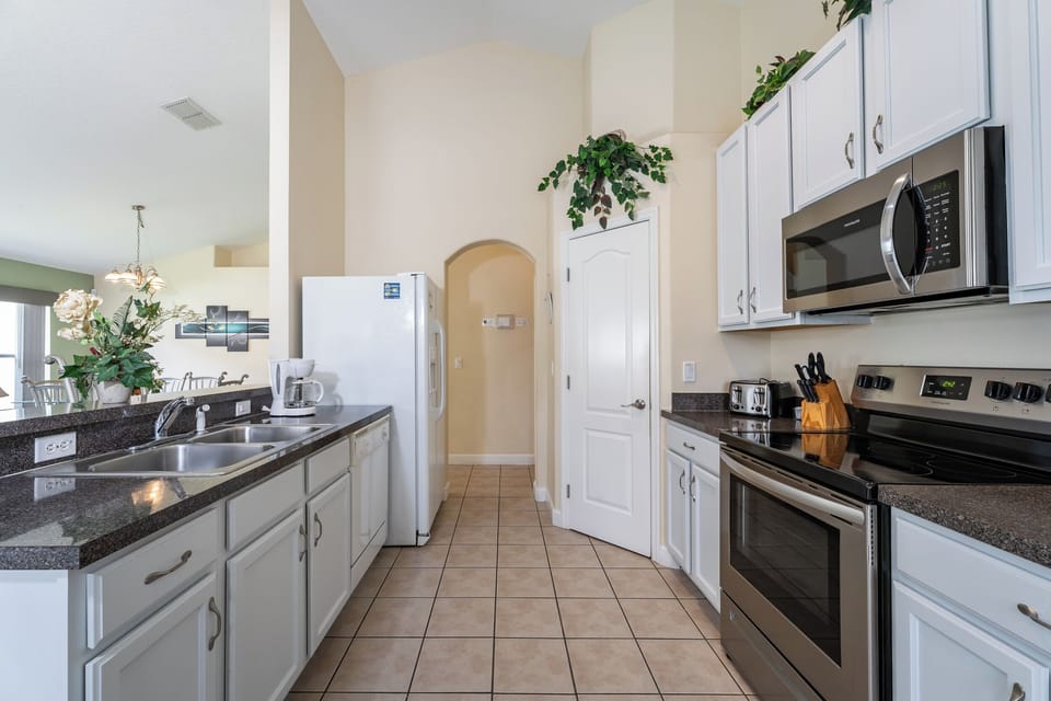 Alternate view from kitchen showing pantry and hall to laundry and bedroom 2.
