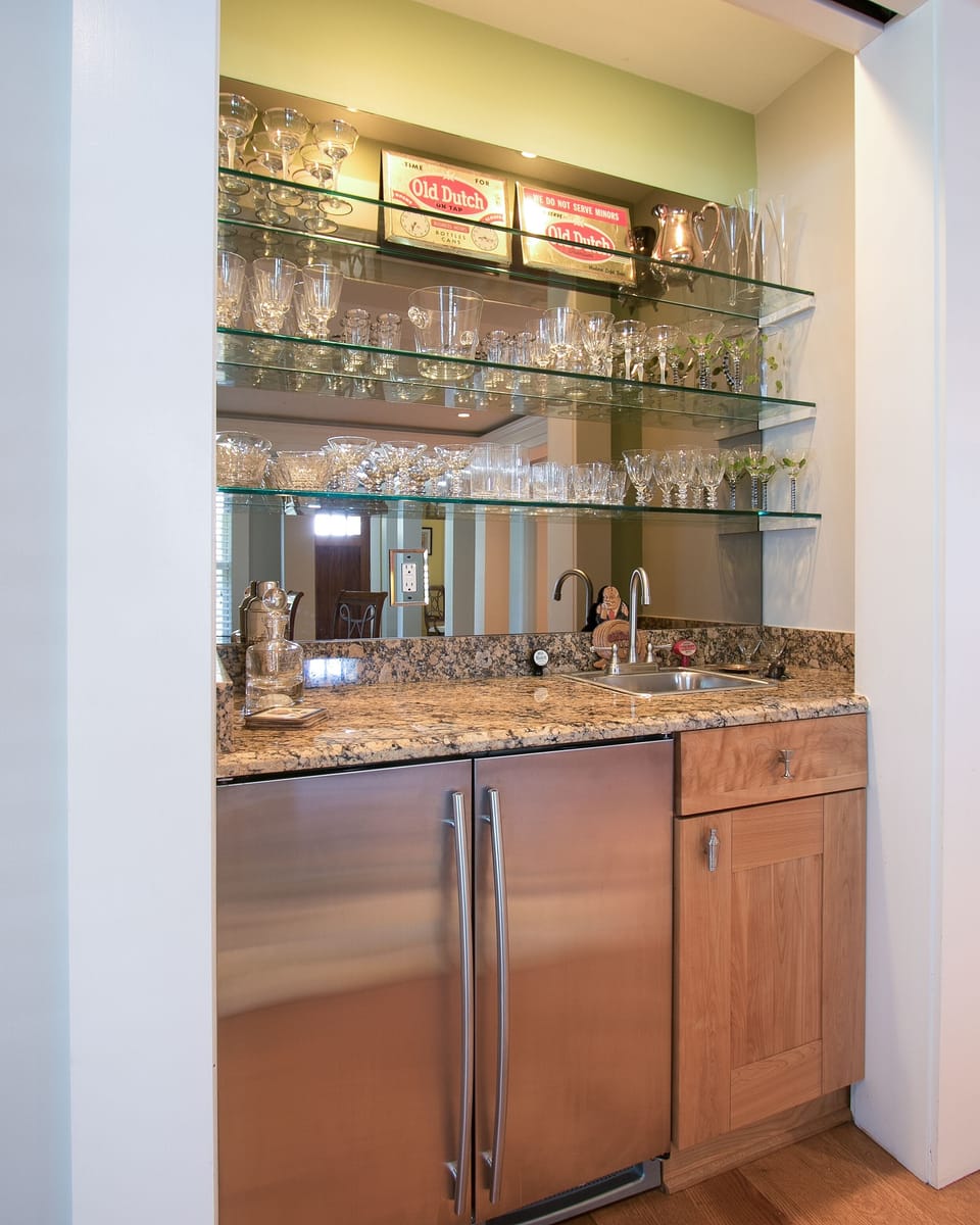 Wet bar with beverage fridge and large capacity ice maker for boat coolers.