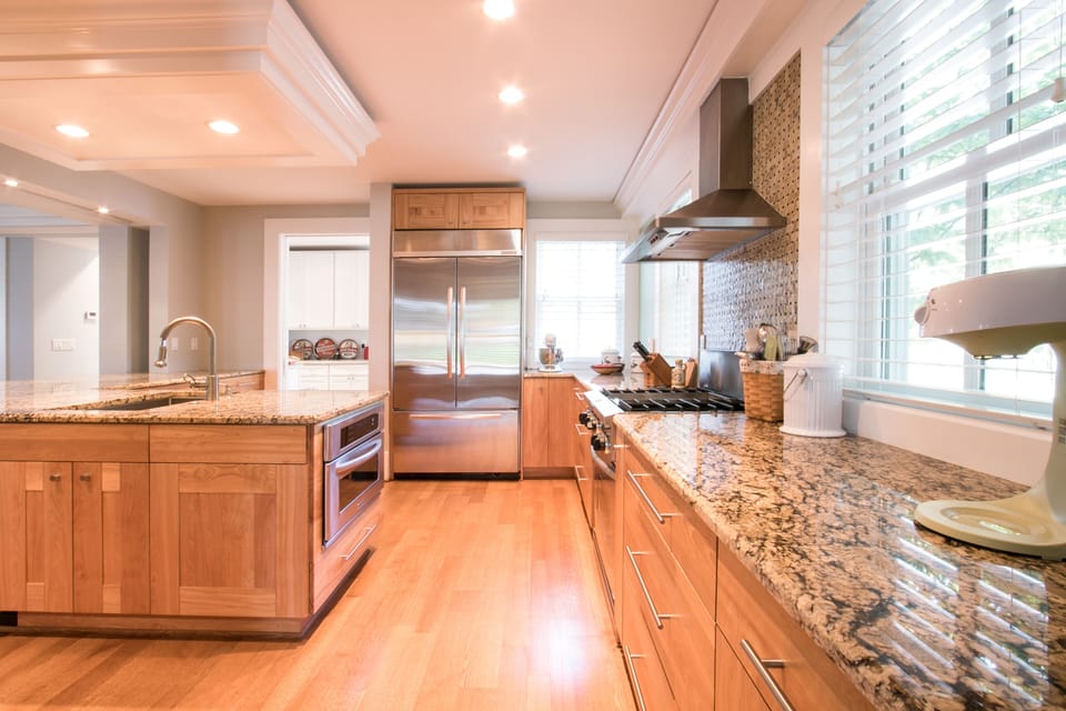 Modern, stainless steel appliances and granite countertops 