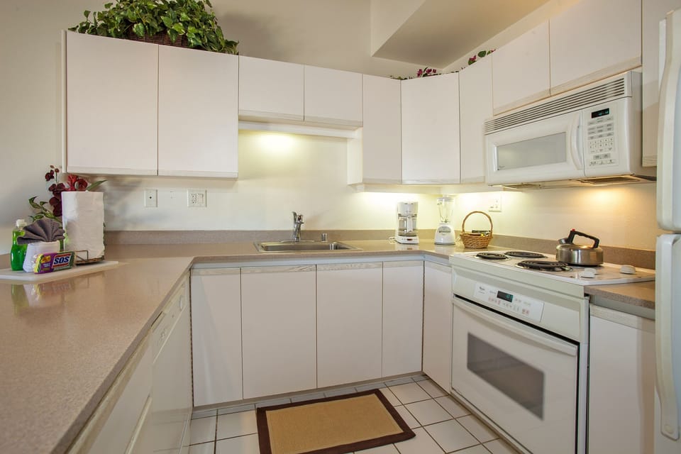 Prepare meals with ease in your fully equipped kitchen, featuring modern appliances, ample counter space, and everything you need to feel right at home.