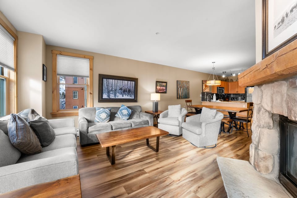 Gather around your cozy stone fireplace after mountain adventures, while the open kitchen invites you to prepare meals together in comfort.