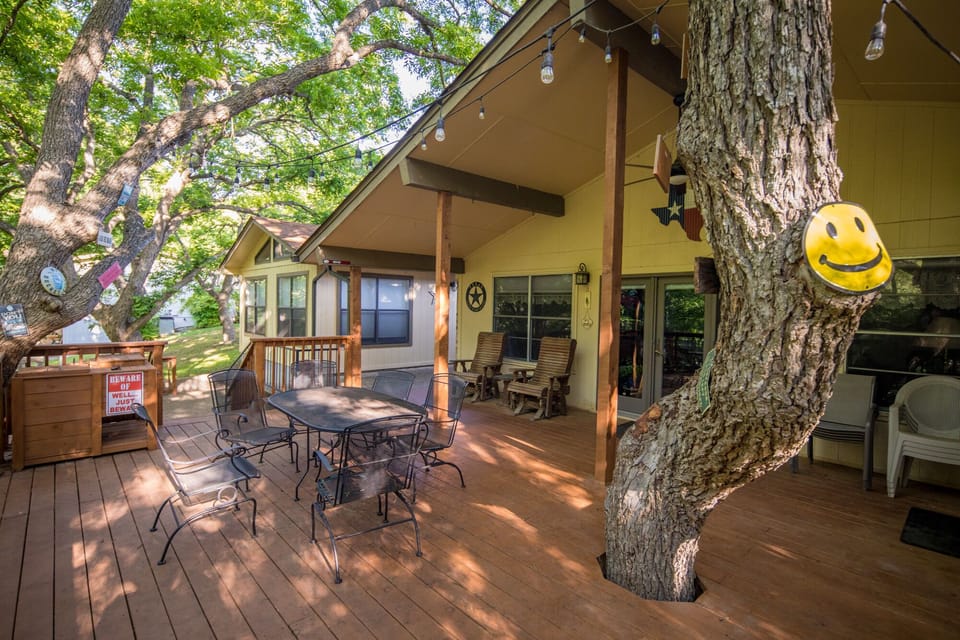 Main & guest house share the shady back deck