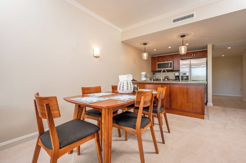 Modern dining and kitchen space designed for comfort and connection.