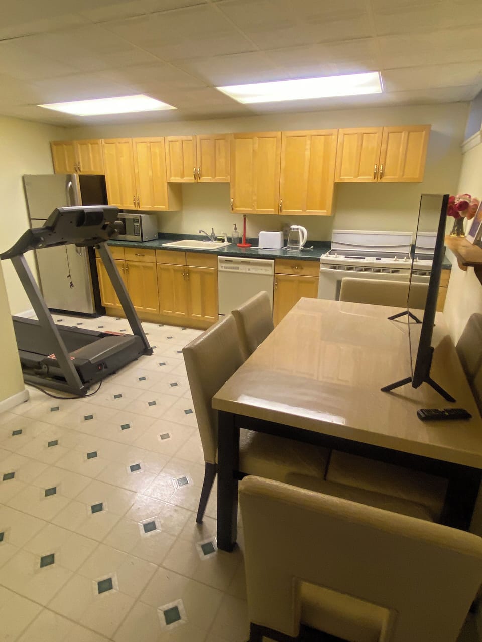 Second kitchen lower level, treadmill in the kitchen if you l like to work out.