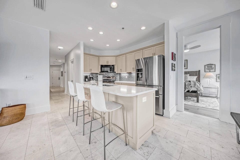 Fully Equipped Kitchen with Quartz Counter-tops with seating at the island for 3