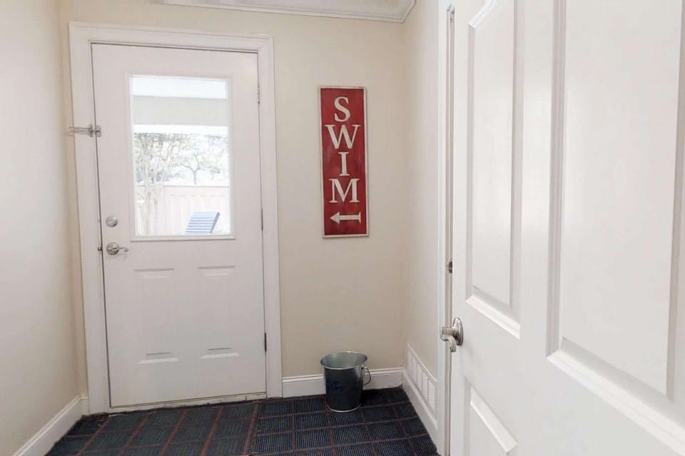 The ground level door leading to your private pool