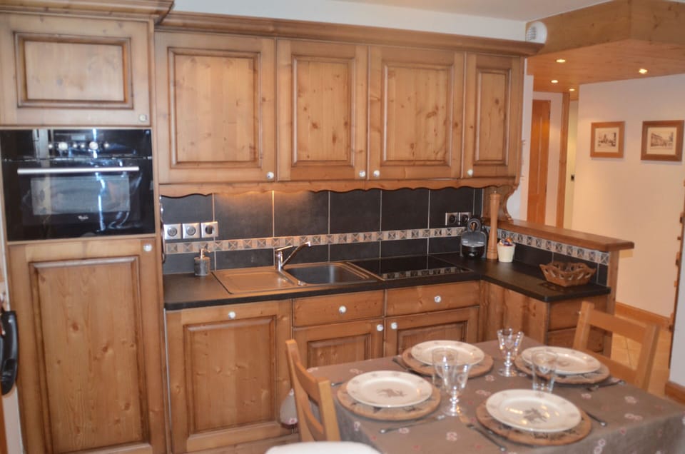 Kitchen and dining.  Table sits 4 and there is an extension to seat 6 if needed