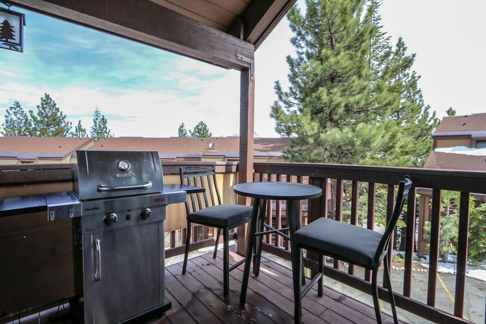 Balcony area with private gas grill and seating