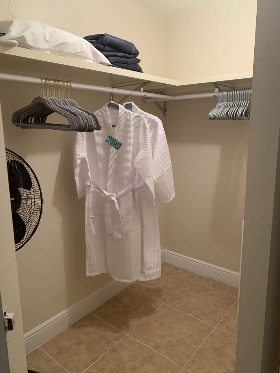One of the Master Closets:  Fans, Hangers, and Spa Robes are in the closets.