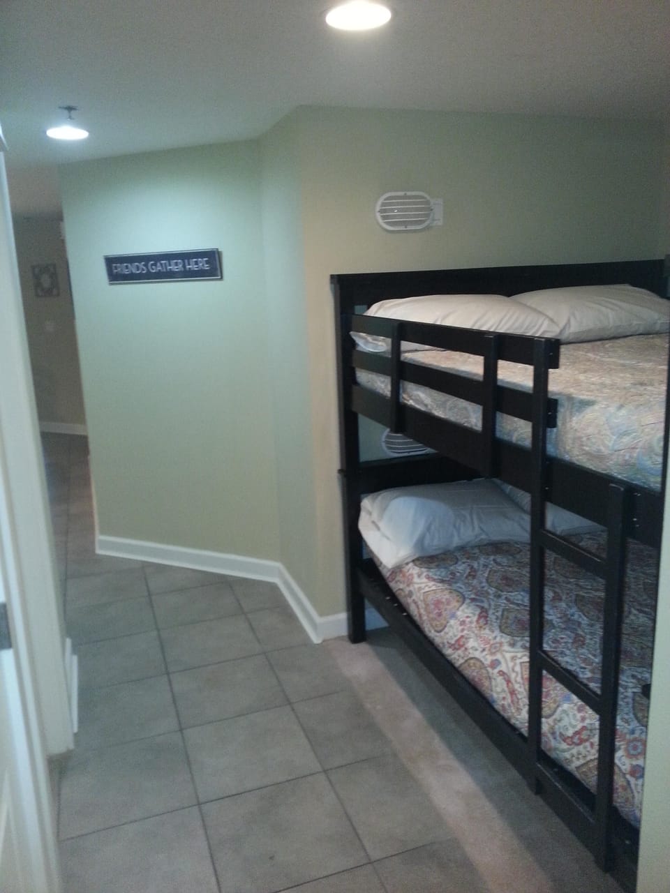 Two Full-Size bunkbed in hallway nook. 