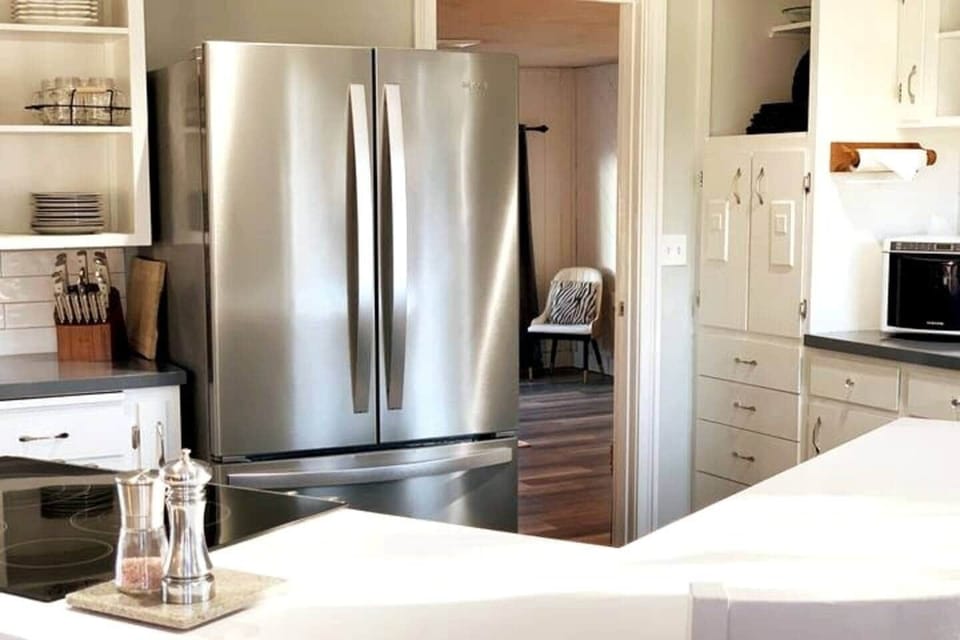 Updated kitchen with stainless appliances and open layout