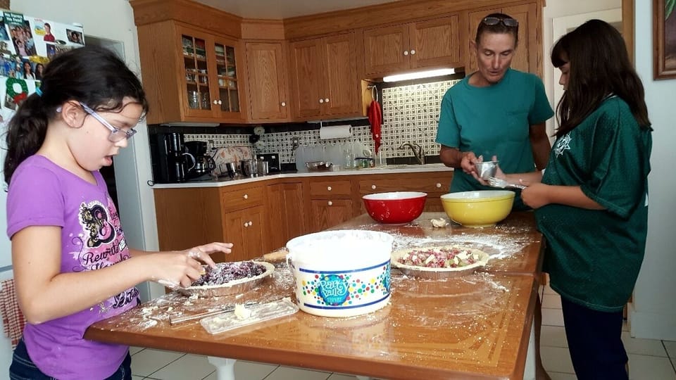 Pie making in the farm house kitchen