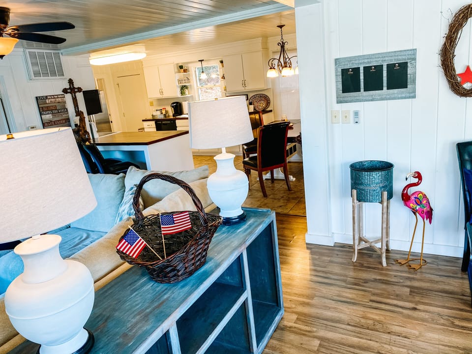 Stow your stuff in the cabinet in the entry!