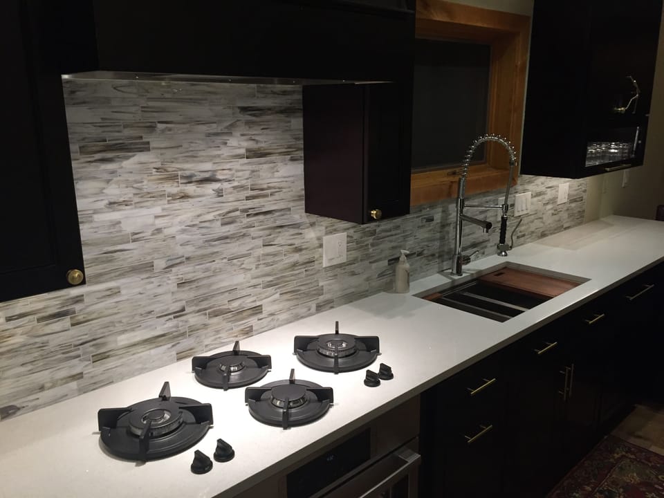 Gas cook top integrated into the quartz counters.