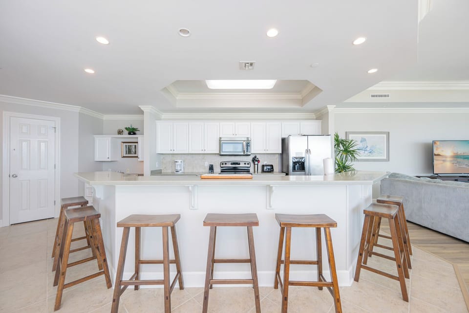 Gather around the breakfast bar to share fresh coffee aromas and laughter before your day on the gulf coast