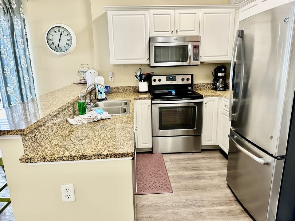 Fully stocked kitchen for preparing meals on vacation!