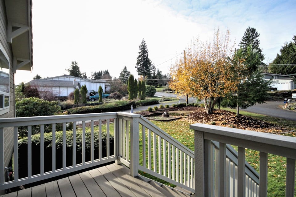 Front door deck entrance looking south at front yard fire pit