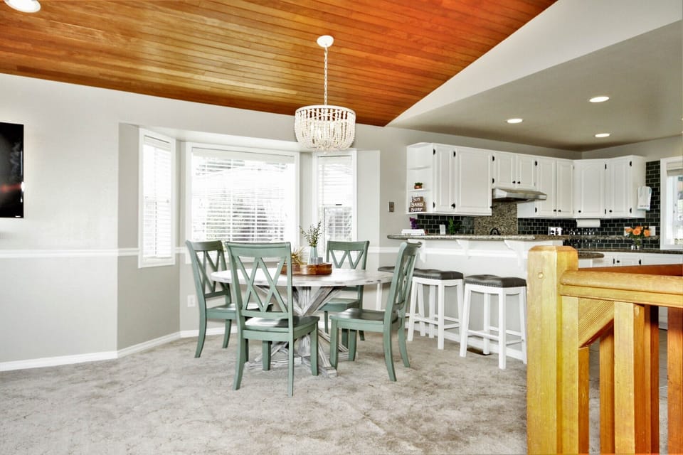 Dining room seating for 6 + 3 at the kitchen bar.  