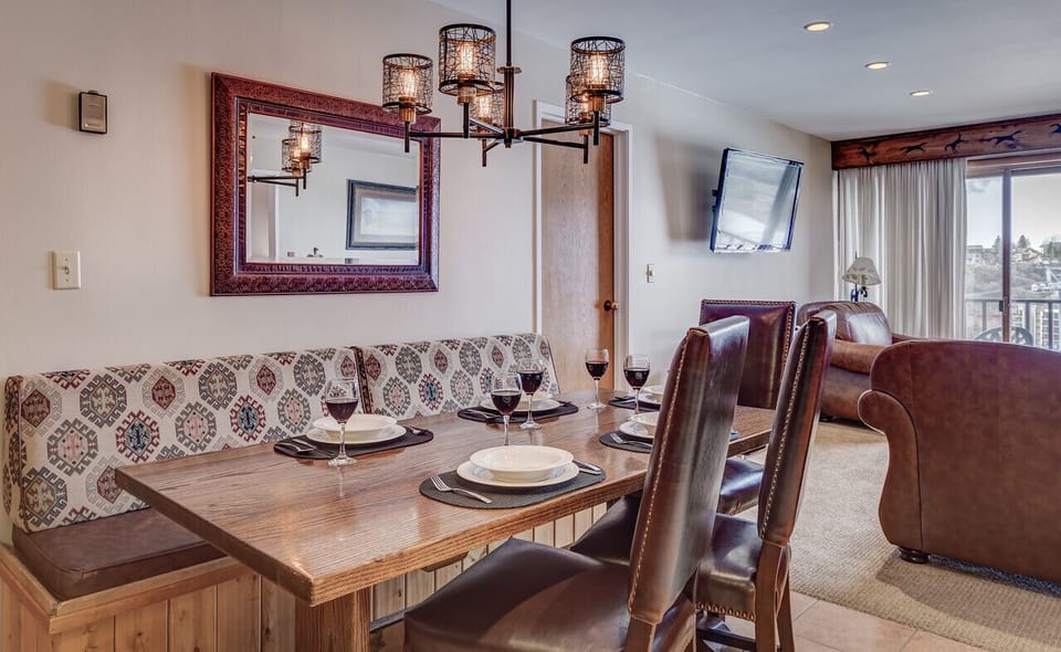 Dining Table, chairs and a bench in our vacation condo in Steamboat Springs