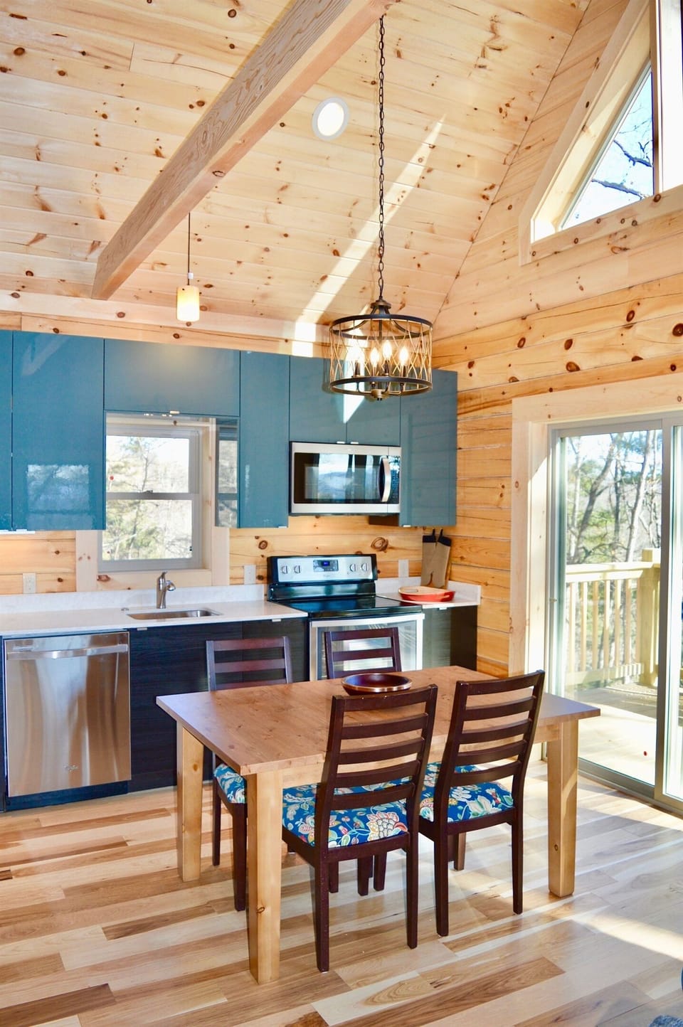 Dining table. Additional leaf can be added to seat eight, extra chairs available